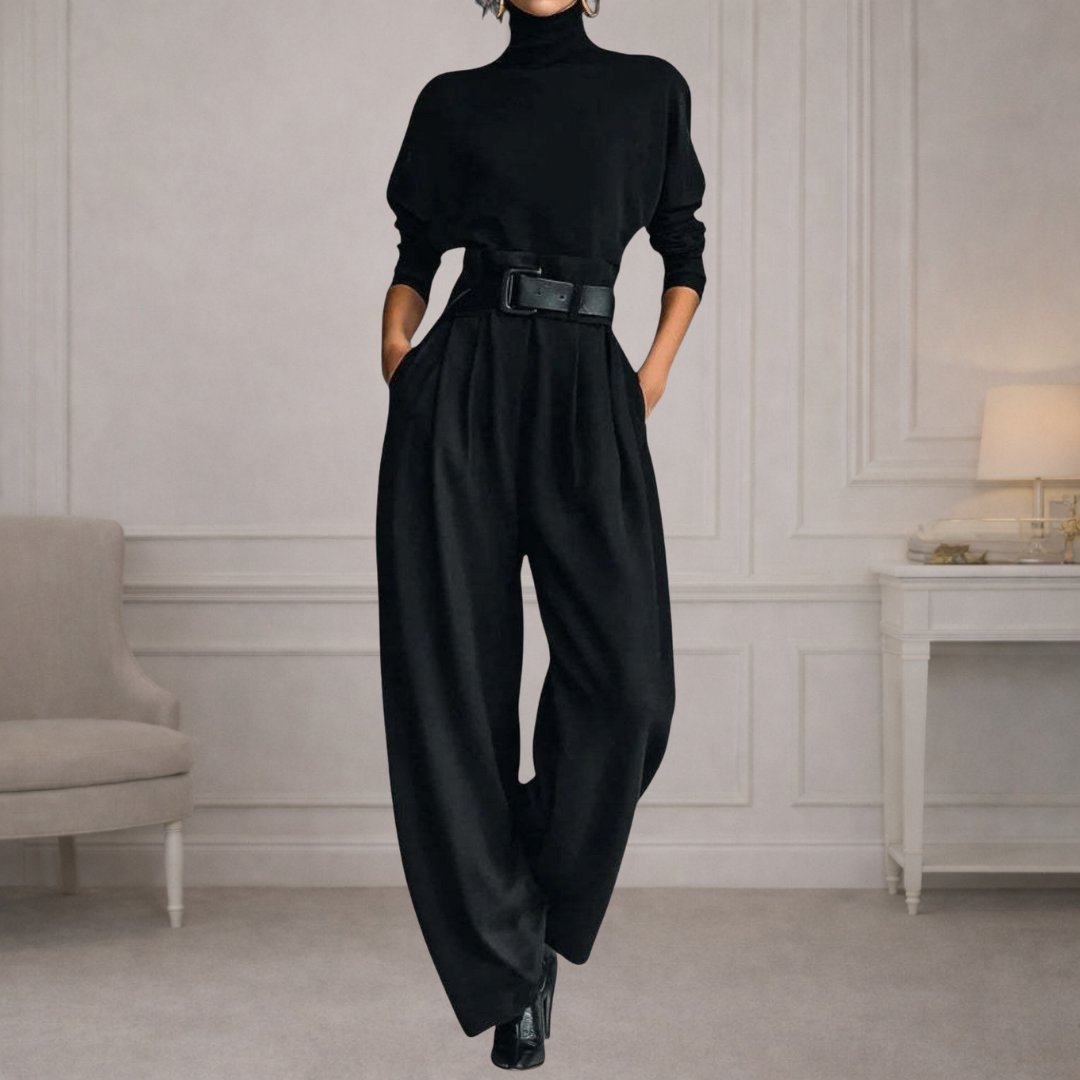 Wide-leg trousers and turtleneck with snakeskin boots